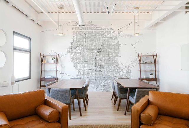 Black and white Las Vegas map wallpaper in an office meeting room